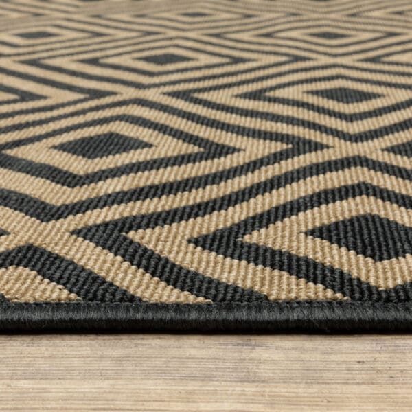 2' X 4' Black and Tan Geometric Stain Resistant Indoor Outdoor Area Rug - Image 4