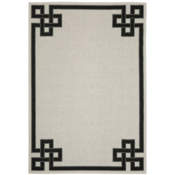 2' x 4' Stain-Resistant Indoor/Outdoor Area Rug - Beige & Black